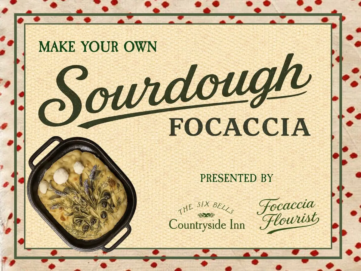 Focaccia bread decorated with edible flowers at The Feathers